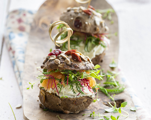 Rustic Dark muesli rolls with smoked salmon, herb cheese and beetroot shoots